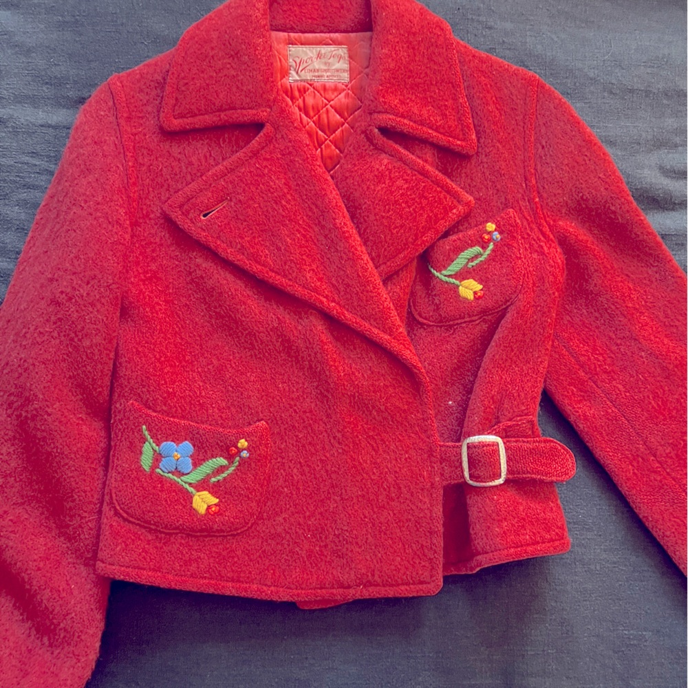 Cropped vintage red wool embroidered peacoat w/silver buckle.